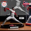Close-up of Aroldis Chapman figurine in a pitching stance, with a display box next to it.