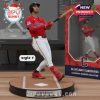 A baseball collectible of Brayan Rocchio finishing a swing, wearing the Cleveland Guardians red jersey and white pants, set on a circular base simulating the batter’s box!
