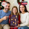 Happy family moment with child holding the Caitlin Clark Advent Calendar, showing how this item brings excitement to young basketball fans during the holiday season!