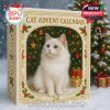 Cat Advent Calendar box with a white kitten illustration and holiday decor, placed on snow with gifts and a Christmas tree!