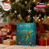 Sea Turtle Advent Calendar under a lit Christmas tree with turtle ornaments hanging on branches above wrapped presents!