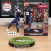 Two Denver Broncos players in touchdown celebration pose mid-air on circular field base with logo and vibrant stadium print in box!