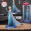 Elsa figurine from Frozen on a computer desk, displayed beside its branded packaging, with a monitor showing its 3D modeling software interface!