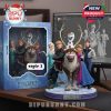Sven Frozen figurine in a funny pose on a blue LED base next to its Frozen-themed box on a wooden desk!