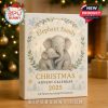 Elegant advent calendar box with cuddling elephant pair on a table near holiday decorations and softly glowing Christmas tree, creating a peaceful seasonal atmosphere!