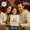 Happy family cuddled together holding festive elephant-themed advent calendar, with glowing Christmas lights in the background showing warmth, love, and holiday excitement!