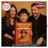A boy and his parents smile together during a holiday moment, with the boy proudly presenting the 2025 Firefighter Tribute Advent Calendar. A wholesome reminder of community pride and appreciation!