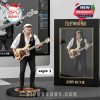 John McVie figurine with a bass guitar, displayed in Fleetwood Mac packaging.