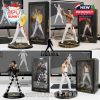 Freddie Mercury figurine collection showcasing multiple performance poses with elegant packaging.