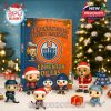 Christmas-themed Edmonton Oilers advent calendar with hockey figures, mascot, and decorations arranged in a winter setting!