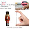 Nutcracker ornament thickness and clear acrylic protection shown with hand reference and peeling film close-up.
