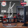 New York Yankees pitcher figurine in a mid-pitch action pose, displayed on a Yankees logo base with dynamic packaging.