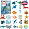A colorful advent calendar featuring sea creatures such as sharks, jellyfish, crabs, and penguins. Each compartment reveals a new ocean-themed collectible.
