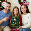 A family celebrating with the Oregon Ducks 2025 Advent Calendar in front of their Christmas tree.