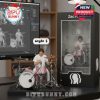 Zac Farro drumming figurine posed behind a custom kit beside a boxed version on a modern desk layout!