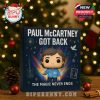 A detailed close-up of the Paul McCartney Got Back Advent Calendar showing collectible figurines that depict various iconic moments of McCartney’s career, with vibrant artwork in the background.