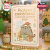 Pusheen Christmas Countdown Calendar for 2025 with a Pusheen figure wearing a Santa hat, surrounded by Christmas decorations.