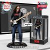 Highly detailed figurine of Geddy Lee with bass guitar, posed with a custom display box on a clean white desk!