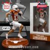 Parker Livingstone Texas Longhorns figure running with ball on branded orange base, dressed in official uniform next to team box!