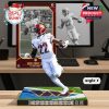 Close-up of a Washington Commanders football figurine showing a player running with the ball, set on a turf-like display.