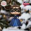 A detailed figurine from The Vampire Diaries Advent Calendar in a blue masquerade gown, captured as a gothic ornament on a holiday tree!