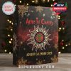 Front view of Alice in Chains 2025 Advent Calendar box in a Christmas-themed room with lights and a warm, nostalgic feel!