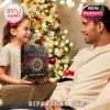 Father-daughter Christmas gift moment featuring the Alice in Chains calendar, surrounded by soft tree lights and holiday warmth!