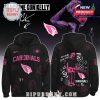 A black hoodie with the Arizona Cardinals logo and Machine Gun Kelly's pink graffiti artwork.