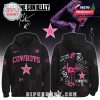 A black hoodie with Dallas Cowboys logo and vibrant pink artwork by Machine Gun Kelly.