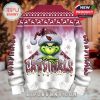 Back view of the Grinch Cardinals Christmas sweater featuring festive design elements.