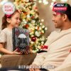 Child gifting Bring Me The Horizon Advent Calendar to dad in a warm holiday setting with lights and tree!