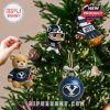 A decorated Christmas tree featuring BYU Cougars ornaments including a teddy bear, a football player, and a branded bauble!