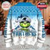 Back of Panthers Grinch Christmas sweater with snowflakes, team logo, and festive light graphics in winter setting!