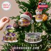 LSU ornaments like snowmen, footballs, and stadium models placed on a decorated Christmas tree!