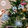 UNC holiday ornaments including football player and accessories hanging from Christmas tree branches!