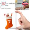 Tennessee football stocking ornament held in hand beside visible acrylic thickness and film demo!