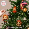 Cyndi Lauper character ornaments decorating a holiday tree with lights and color!