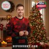 Man wearing Atlanta Falcons Stranger Things sweater in front of Christmas tree and fireplace!