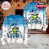 Combined front and back view of the holiday sweater with The Grinch and LIONS theme, displayed together to highlight the full winter design in a cozy festive environment!