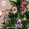 Five Finger Death Punch Christmas tree with themed ornaments including band artwork, figurines, and skull designs in red and black!