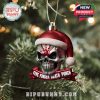 Five Finger Death Punch skull ornament with red Santa hat, hanging on a Christmas tree as part of the metal-themed advent set!