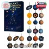 Complete set of 24 astronomy-inspired ornaments next to a star-filled Galaxy Exploration 2025 advent calendar box!