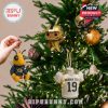 Decorated Christmas tree featuring Georgia Tech player ornaments, mascot Buzz, and team jersey pieces as festive hanging decorations.