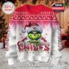 Detailed front view of the sweater with red and white gradient, festive knit patterns, and bold team branding around the Grinch character!