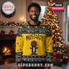 Cartoon Lamar Mustard sweater with Christmas patterns in yellow worn in a festive setting!