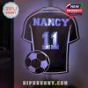 A purple football shirt light with customizable name and number to add a personal flair.