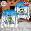 A pair of Chargers Christmas sweaters with a full wraparound design of the Grinch, perfect for showcasing both front and back in a holiday-themed room!
