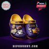 LSU Crocs under spotlight with dark background emphasizing colors and design!
