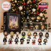 Metal Gods Advent Calendar and rock star mini figures displayed in front of Christmas tree.