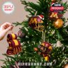 Team-themed decorations from the Minnesota set placed creatively on a lit Christmas tree!